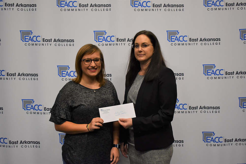 Swindle Scholarship recipient, Mallory Ellis, receives Foundation scholarship award from Dr. Cathie Cline, EACC President