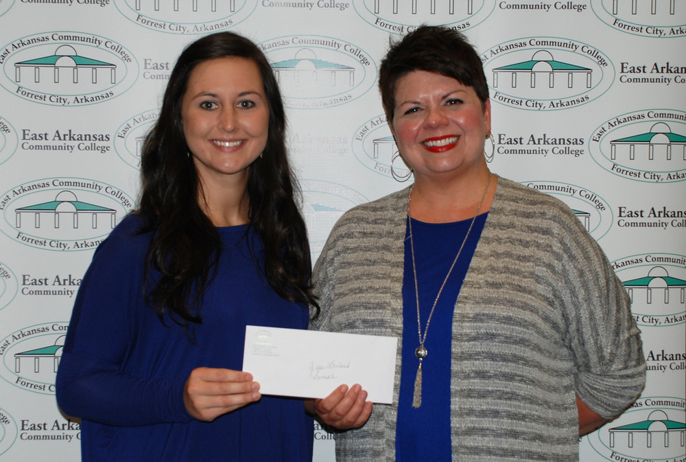 Photo 1 from left: Jessie Bouland, scholarship recipient, and Niki Jones, EACC Director of Development.